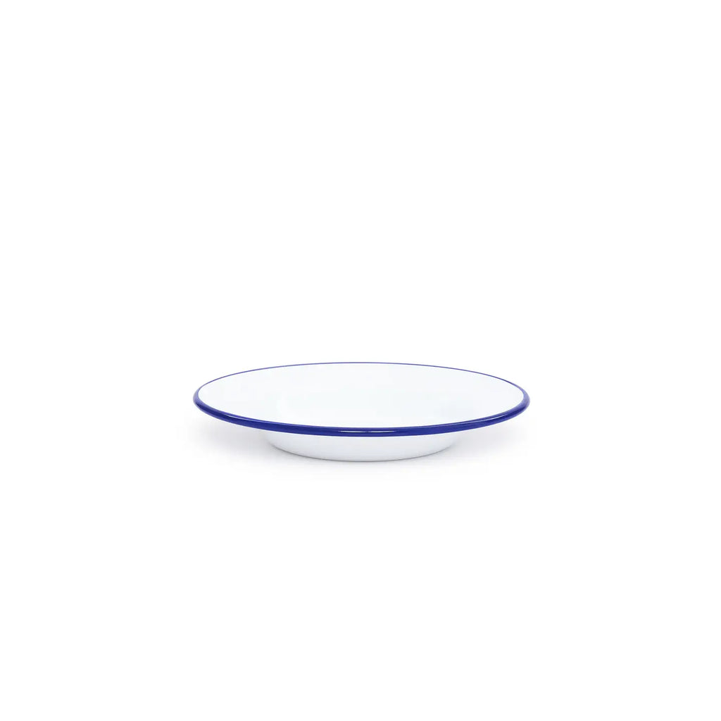 White bowl with blue rim on a white background