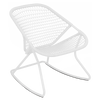 A white aluminum and fiber woven rocking chair.