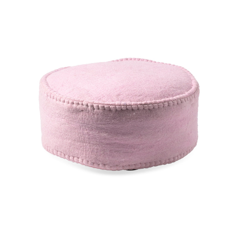 Rose pink fabric floor cushion with a white background.