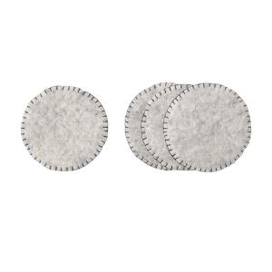 Handmade wool coasters in raw grey.