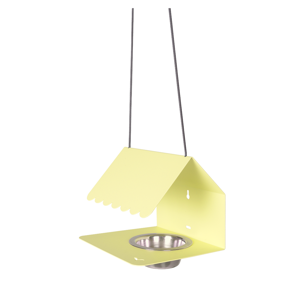 A yellow Picoti bird feeder with a stainless steel bowl, hanging from a cord.