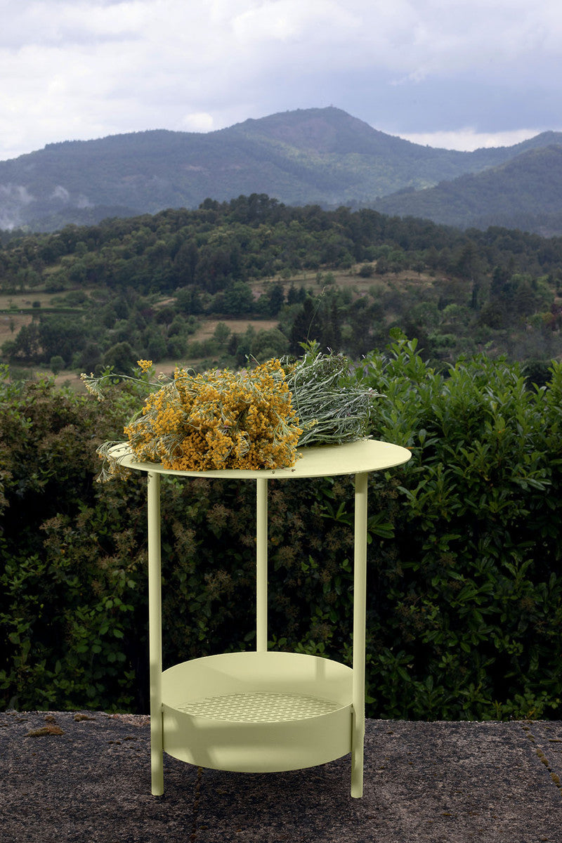 A green Salsa Side Table with a steel frame, a steel sheet table top, and a steel mesh bottom.