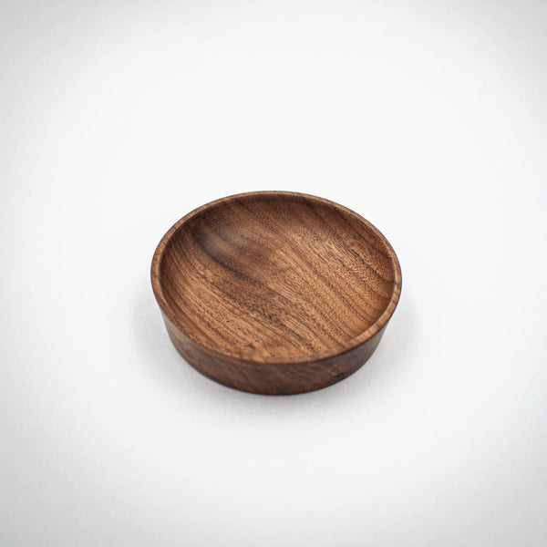 Wooden bowl on a white background
