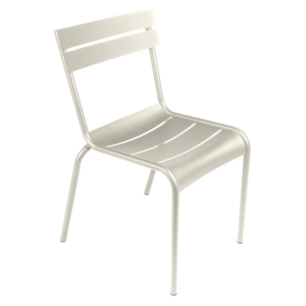 One cream Luxembourg side chair with tubular aluminum frame and curved aluminum slats.