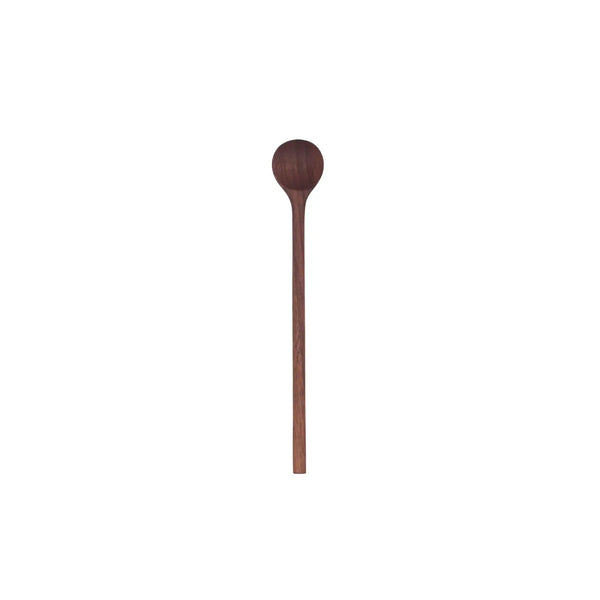 A single walnut wood stirring spoon on a white background.