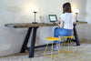 A modern, yellow Cocotte Stool with a steel rod frame.