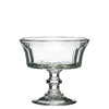 Clear glass footed bowl on a white background
