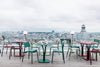 Red, green and cactus lightweight aluminum chairs with curved seat for comfort. 