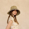 Model wearing Capri Sun Hat