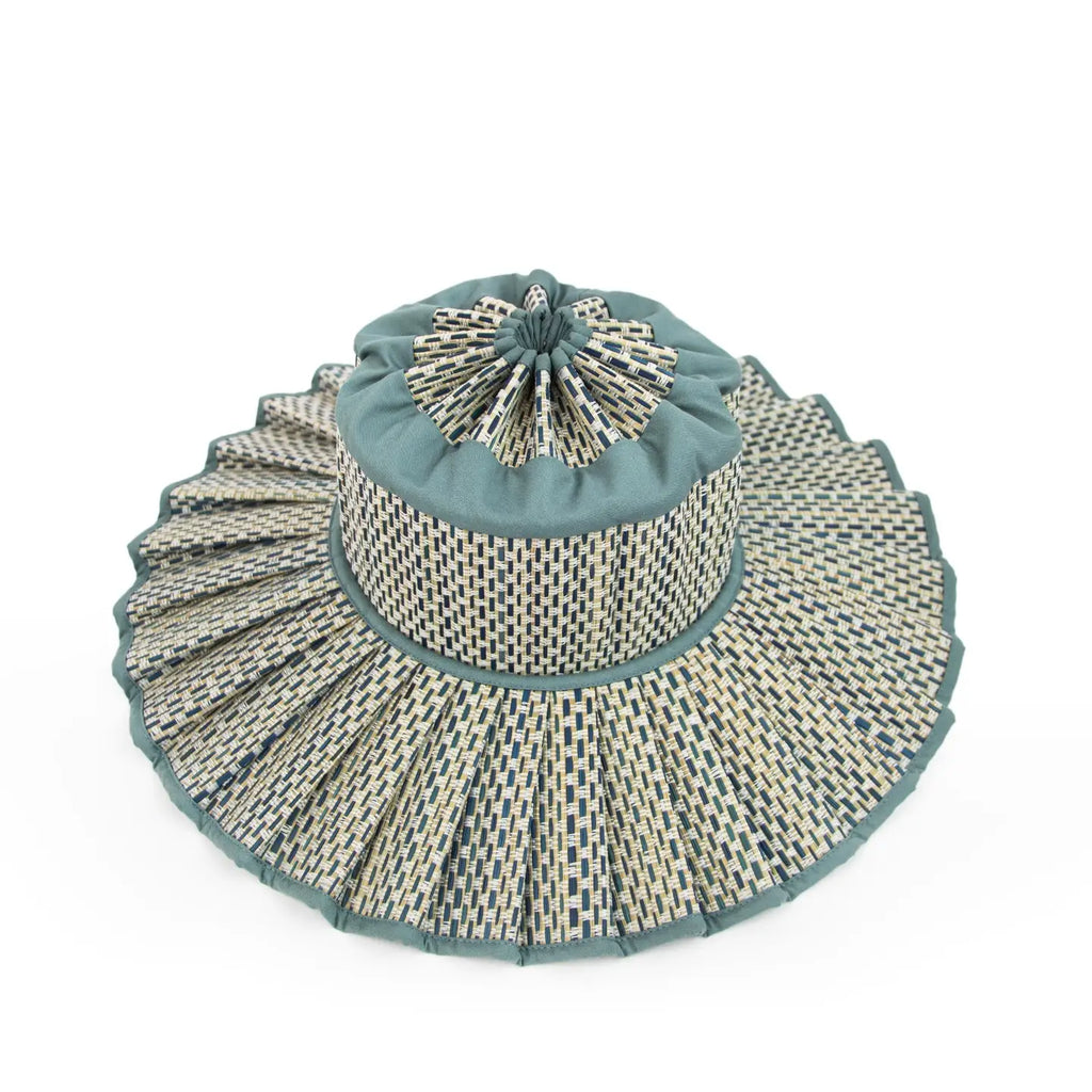 Decorative Lorna Murray Burano Capri Sun Hat with a blue top on a white background