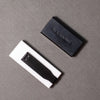 White eraser with 'BLACKWING' branding on a gray surface