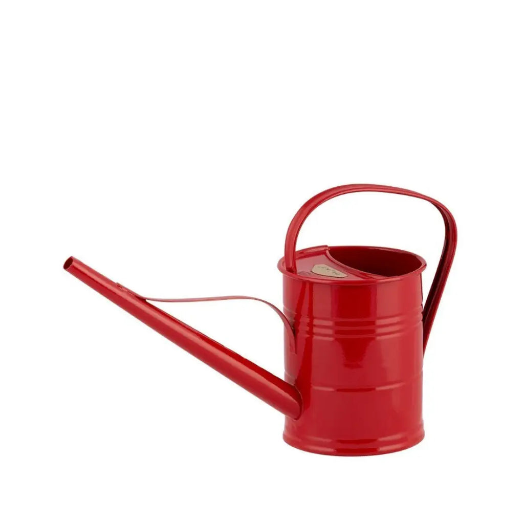 A red galvanized steel watering can