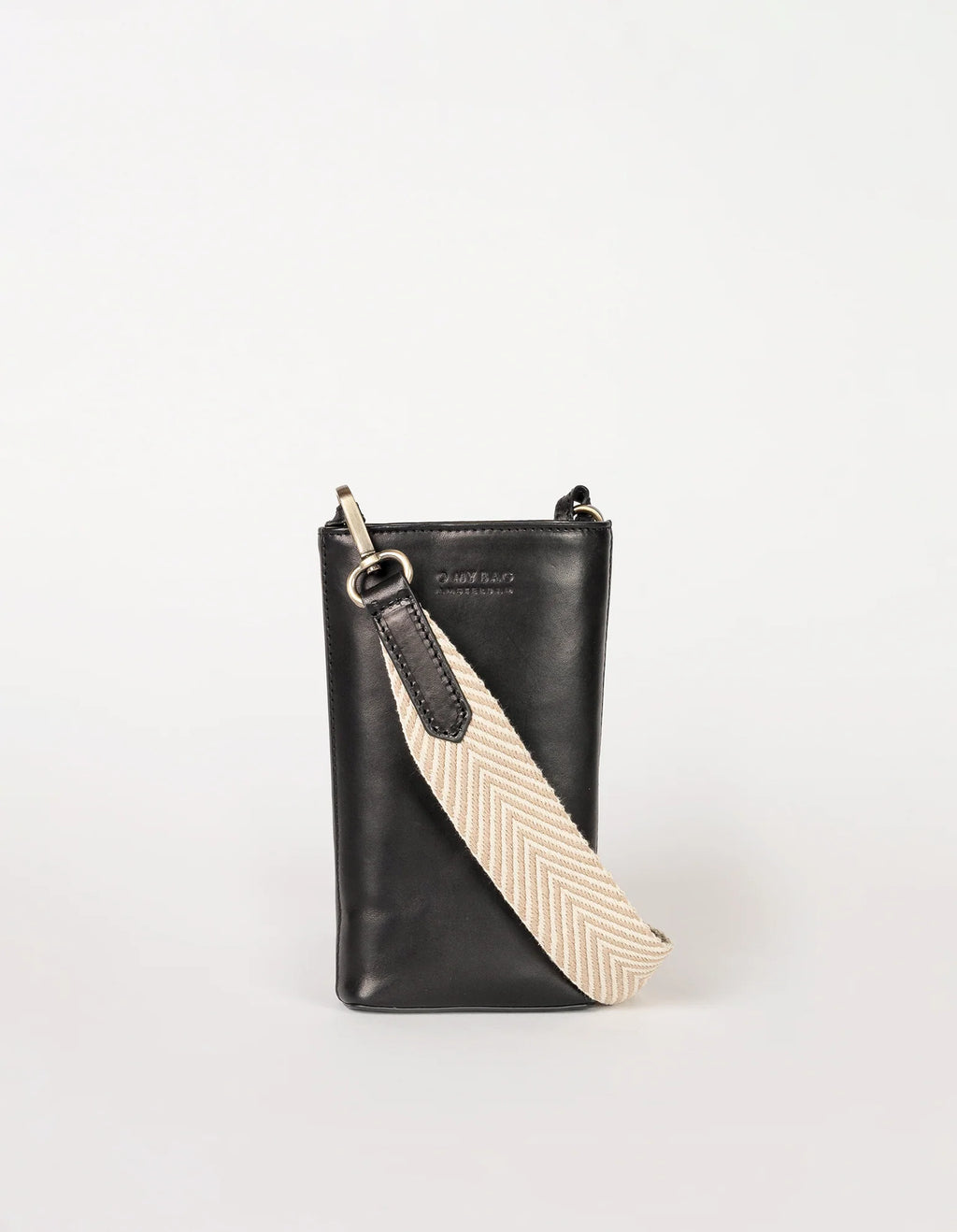 A black Charlie Phone Bag with a striped cotton lining, featuring a main compartment, three card slots, and two straps including a tan one and a beige one with a geometric pattern.