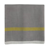 Gray towel with a yellow stripe on a white background