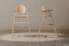 A front and profile view of high chair