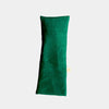 Forest green eye pillow on a white background