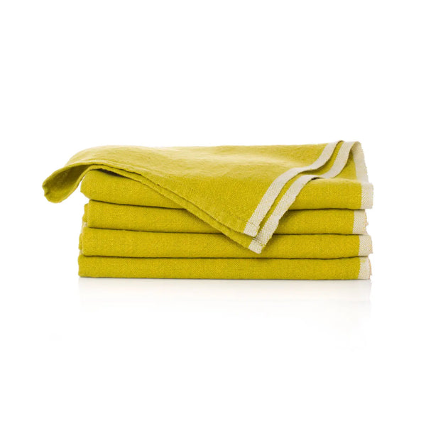 Stack of yellow towels with white trim on a white background