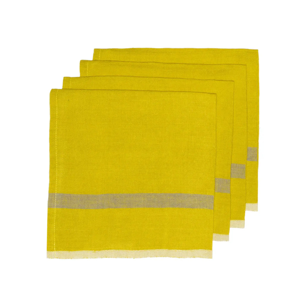 Set of four yellow napkins with beige stripes on a white background