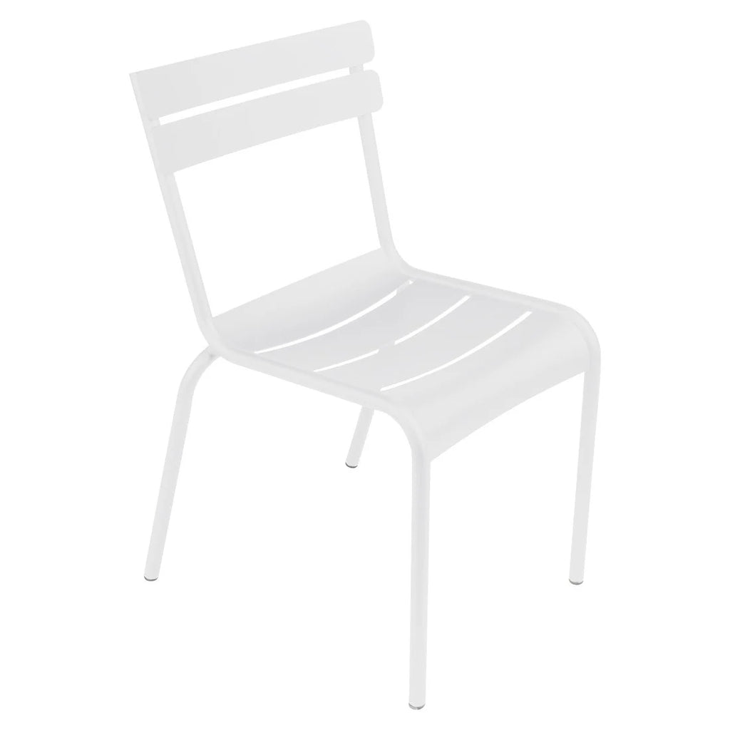 One white Luxembourg side chair with tubular aluminum frame and curved aluminum slats.