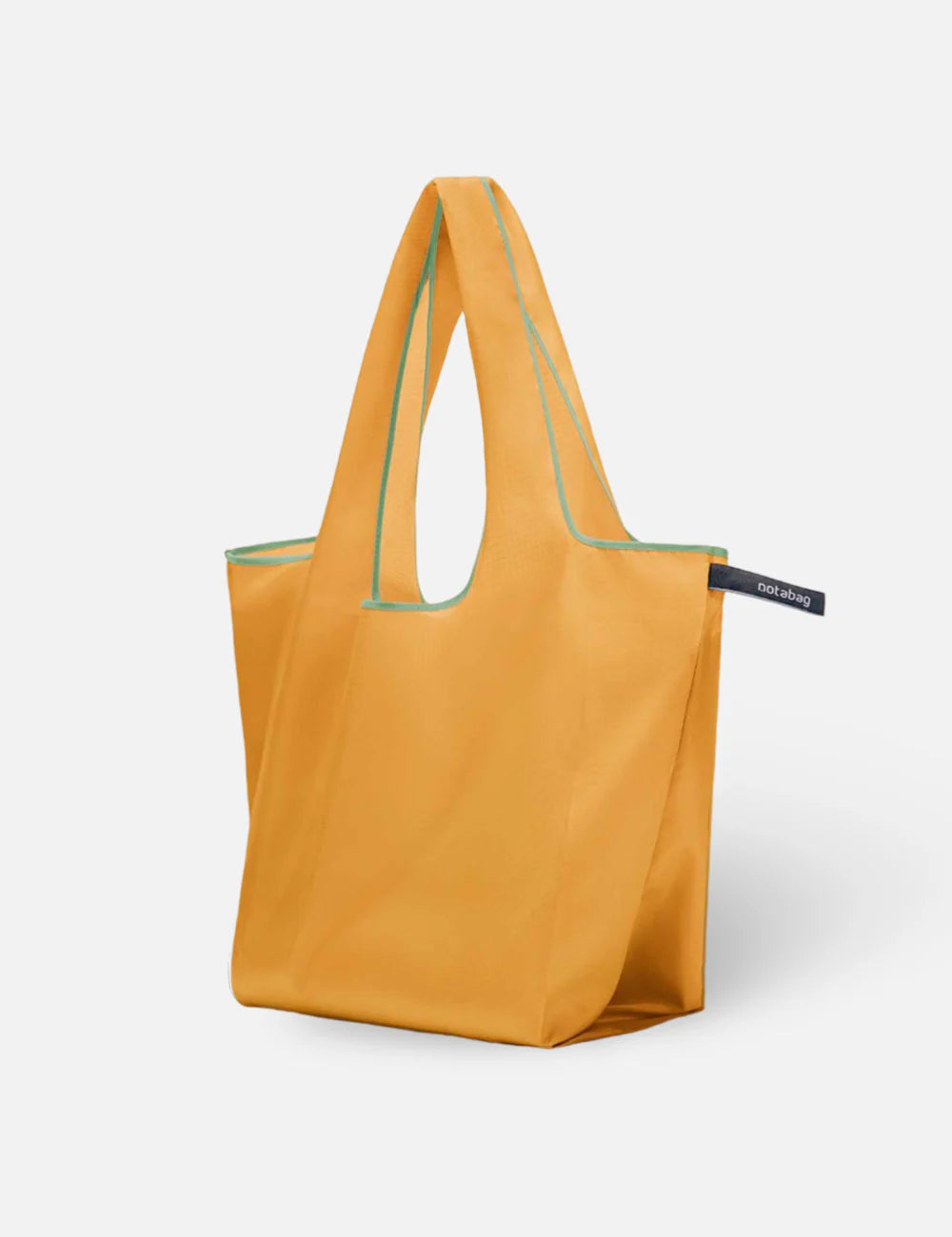 Yellow tote bag with green trim on a white background