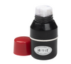 A black Niwaki oil dispenser with a red cap, designed for applying camellia oil to tools to prevent rust.