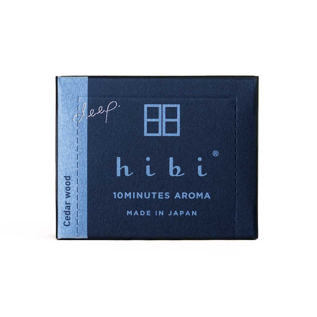 Blue packaging of hibi cedar wood incense with text on a white background