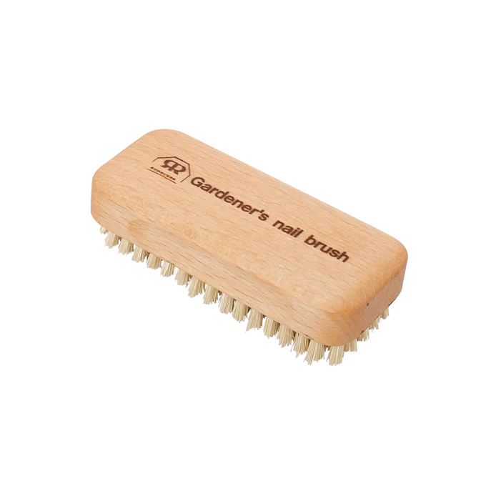 A wooden gardener's nail brush with light natural wood handle and cream-colored bristles, shown on a plain white background. The handle is engraved with the brand logo and the text 'Gardener's nail brush'.