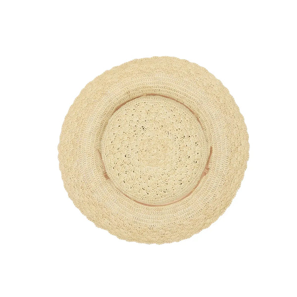 Beige straw hat with a wide brim on a white background, top view