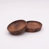 Two wooden bowls on a white background