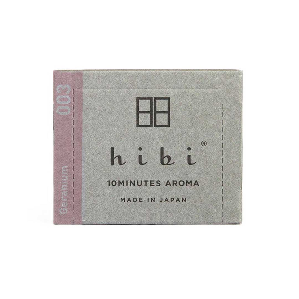 Gray packaging of hibi with pink accent on a white background
