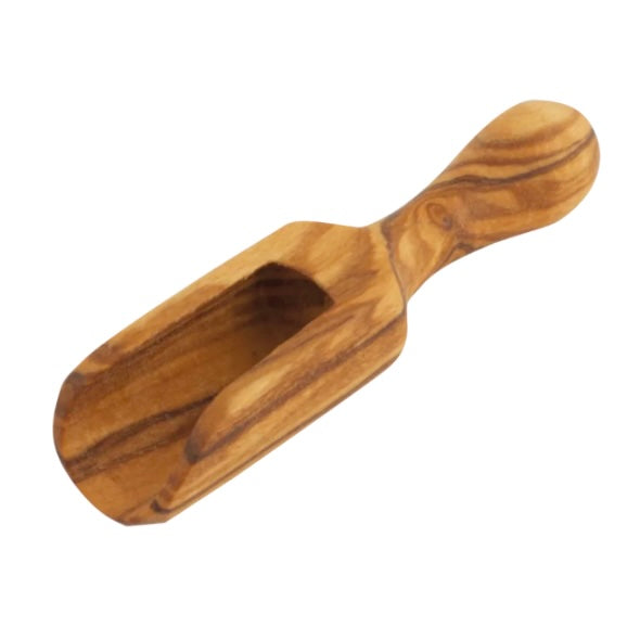 Wooden scoop on a white background