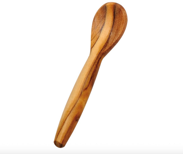 Wooden spoon on a white background