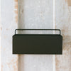 A black powder-coated planter box