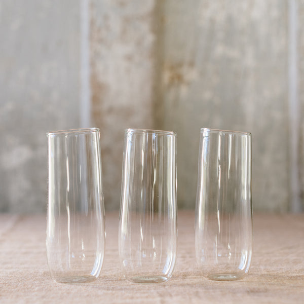 3 flutes made from clear glass. 