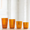 Different sizes of amber drinking glasses