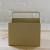 A tanish colored planter box